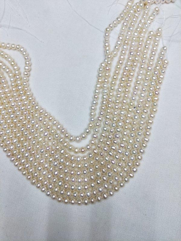 small white pearl strands