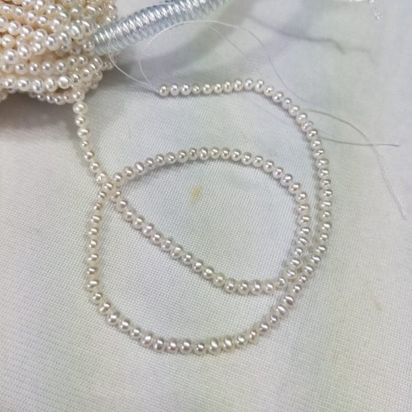 loose white 4mm potato round cultured freshwater pearl strings for wholesale - Image 2