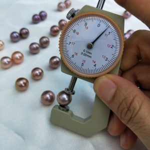 loose round purple pearls