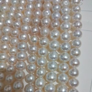 white cultured pearl strands
