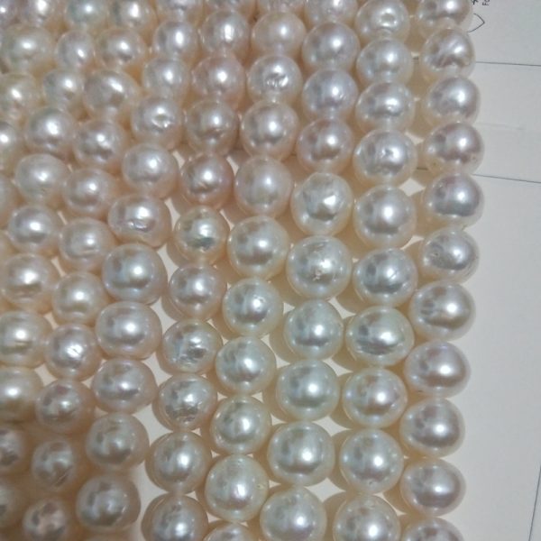 white cultured pearl strands
