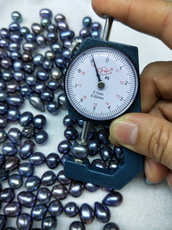 1.0 mm Half drilled 9mm peacock blue loose freshwater rice pearls - Image 3