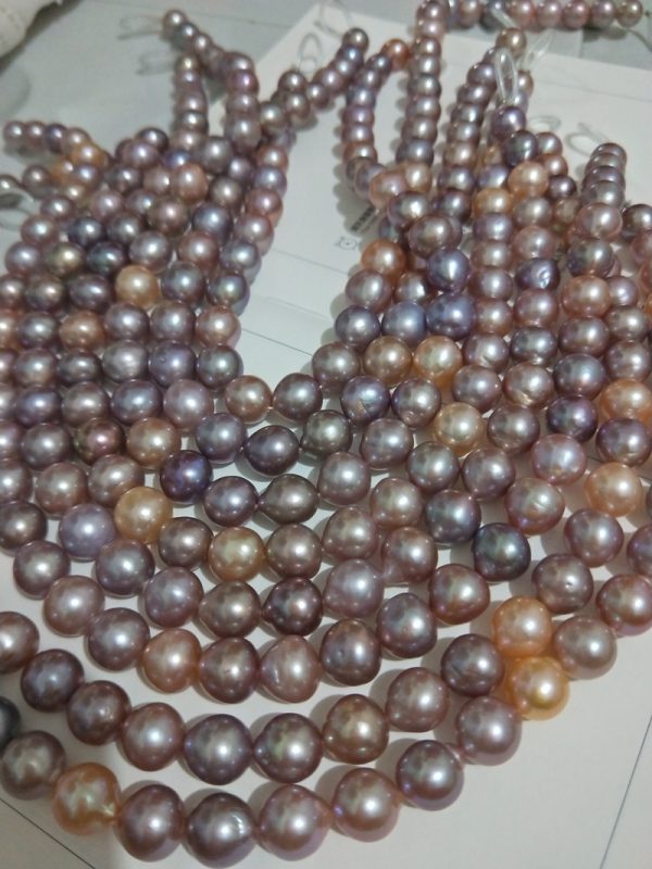 hand-crafted material natural pink and purple mixed drop shaped edison nucleated freshwater pearl strands 16 inch