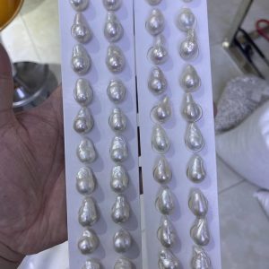 white natural baroque loose pearl pairs