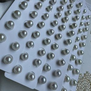 white cultured round studs pearls