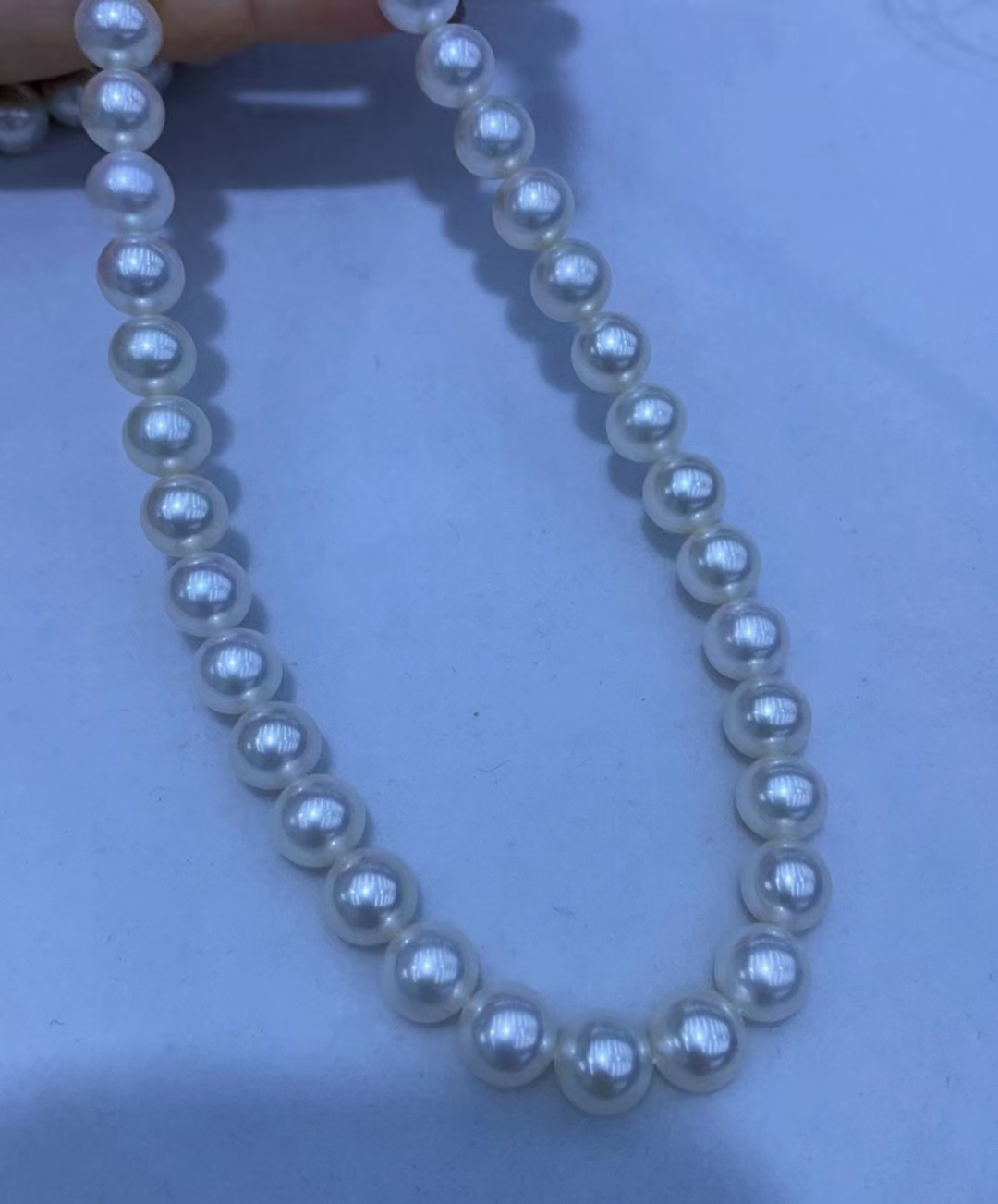 white round pearl strands