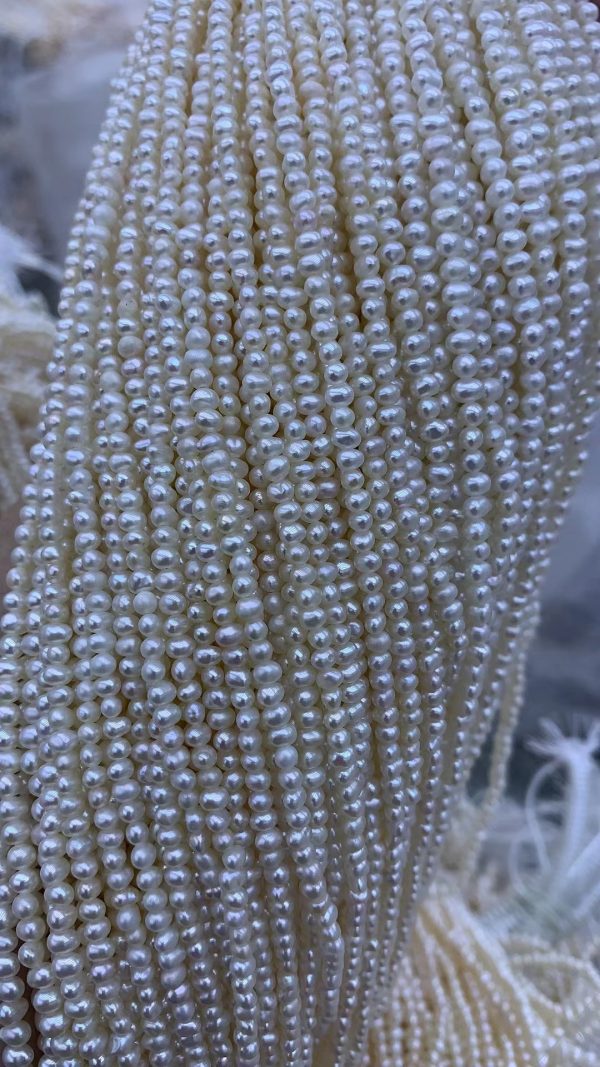 white cultured freshwater pearl strands