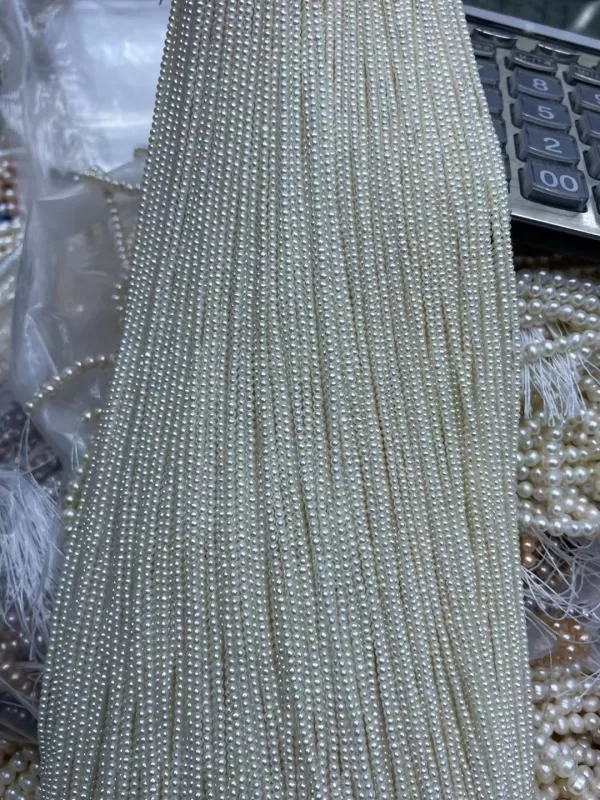 near round 3mm freshwater pearls - Image 2